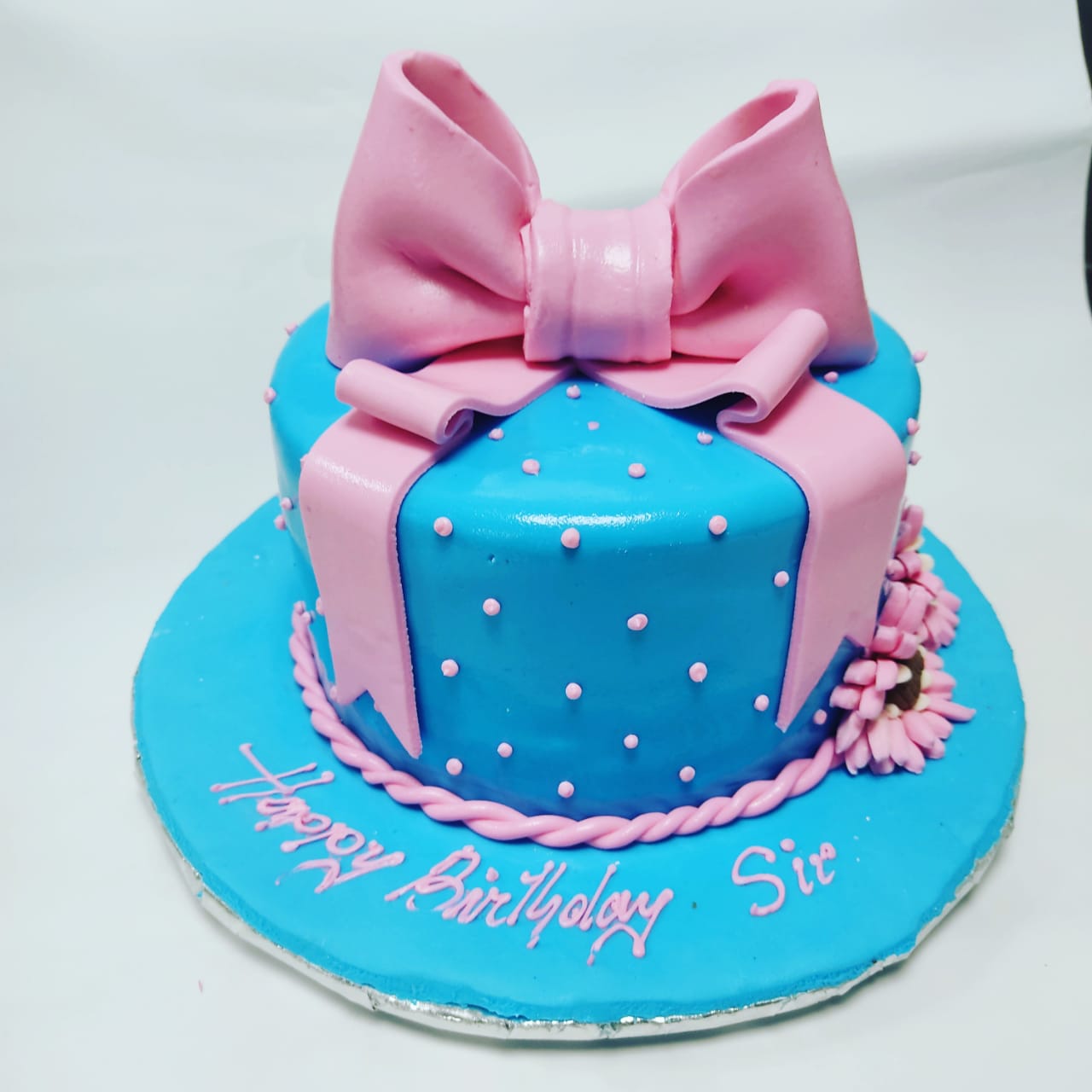 Buy Pink bow wrap chocolate cake online | Free same day delivery | Cakiyo