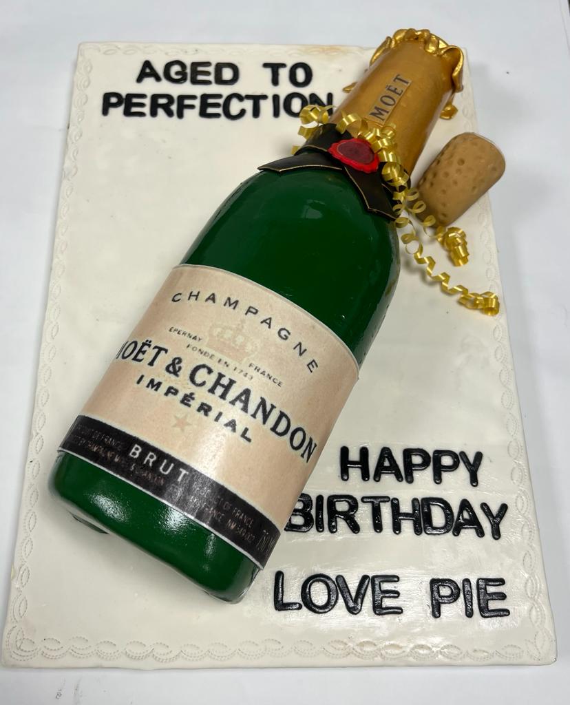How to Make a Champagne Bottle Cake - YouTube